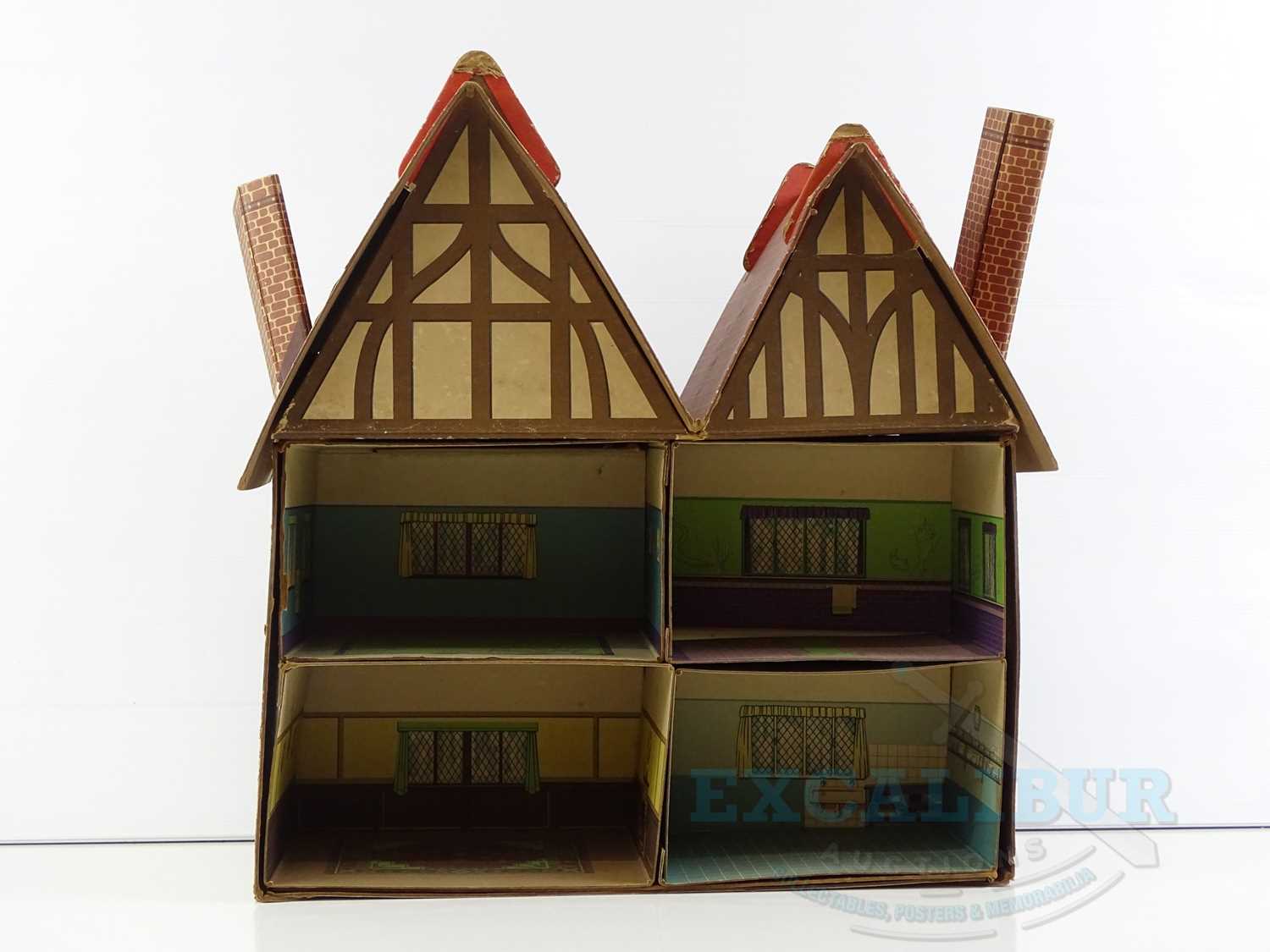 Lot 51 A DINKY prewar 'Dolly Varden' Dolls House