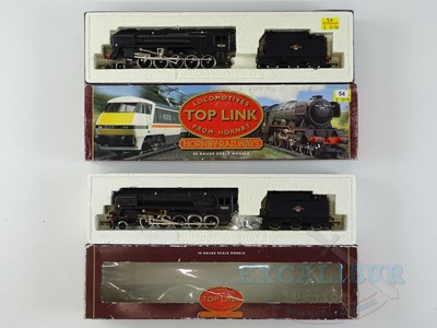 Lot 522 - A pair of HORNBY OO gauge class 9F steam...