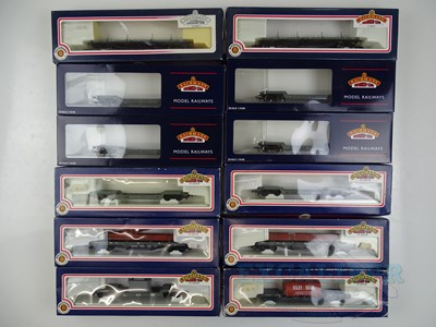 Lot 561 - A group of BACHMANN OO gauge bogie flat wagons...