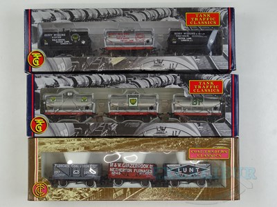 Lot 575 - A group of BACHMANN OO gauge triple wagon...