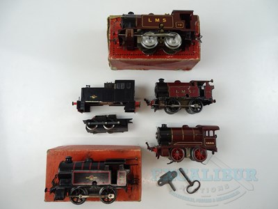 Lot 607 - A group of O gauge clockwork and electric...