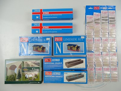 Lot 62 - A collection of ex-shop stock PECO N gauge...