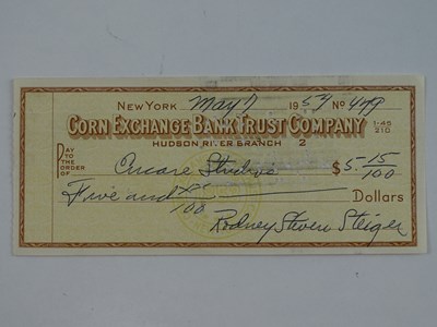 Lot 25 - A ROD STEIGER signed cheque dated May 7th 1954...