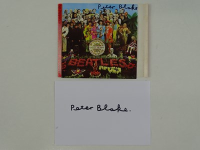 Lot 106 - THE BEATLES - A pair of items to include a CD...