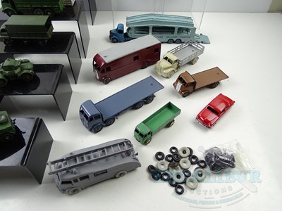 Lot 105 - A group of playworn and restored DINKY toys...