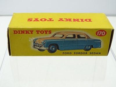 Lot 107 - A DINKY 170 Ford Fordor Sedan lowline cream /...