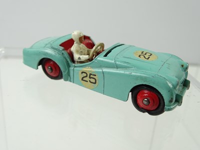 Lot 110 - A pair of DINKY 111 Triumph TR2 Sport cars -...