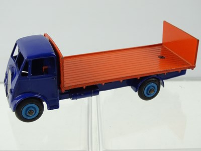 Lot 114 - A DINKY 433 Guy Flat Truck, 2nd Style Cab with...