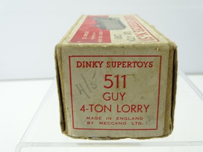Lot 117 - A DINKY SUPERTOYS 511 Guy 4-Ton Lorry, 1st...