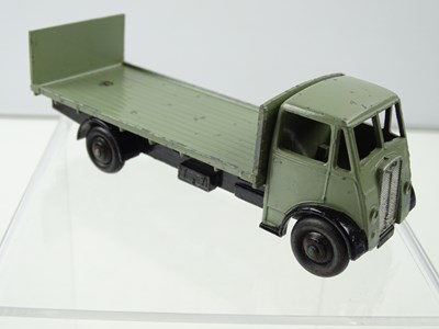 Lot 121 - A DINKY 513 Guy Flat Truck, 1st Style Cab with...