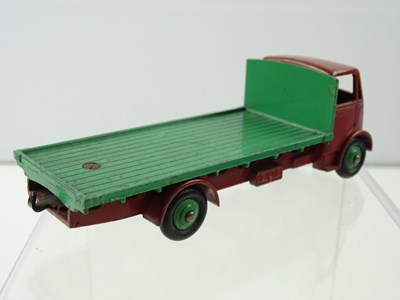 Lot 122 - A DINKY 512 Guy Flat Truck, 1st style cab, in...