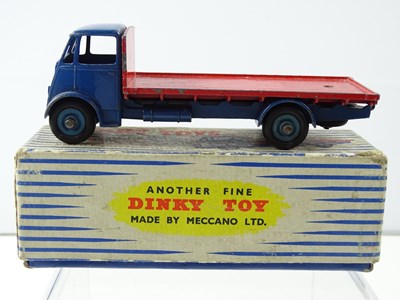 Lot 124 - A DINKY 512 Guy Flat Truck, 2nd Style Cab in...