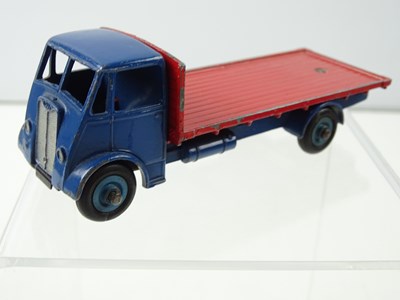 Lot 124 - A DINKY 512 Guy Flat Truck, 2nd Style Cab in...
