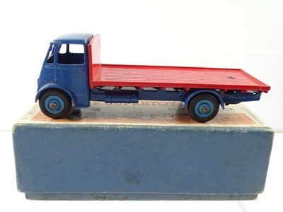 Lot 125 - A DINKY 512 Guy Flat Truck, 2nd Style Cab in...