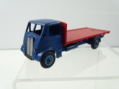 Lot 125 - A DINKY 512 Guy Flat Truck, 2nd Style Cab in...
