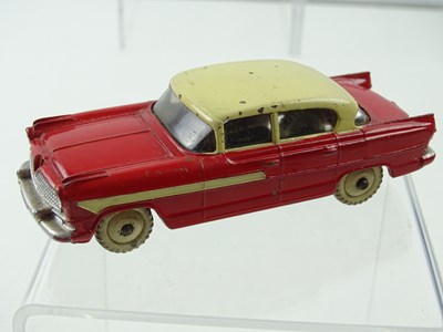 Lot 134 - A DINKY 174 Hudson Hornet, with windows, red...