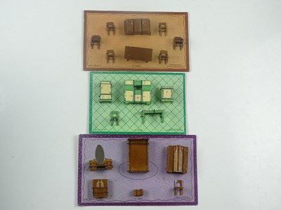 Lot 199 - A group of three Pre-War DINKY Toys Furniture...