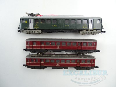 Lot 213 - A pair of N gauge European outline railcars by...