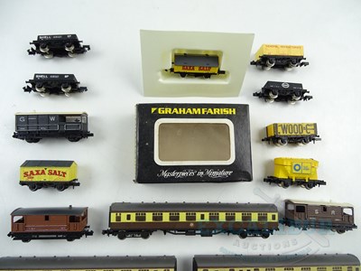 Lot 221 - A group of GRAHAM FARISH N gauge wagons and...