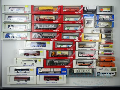 Lot 269 - A quantity of HO gauge lorry and bus models by...