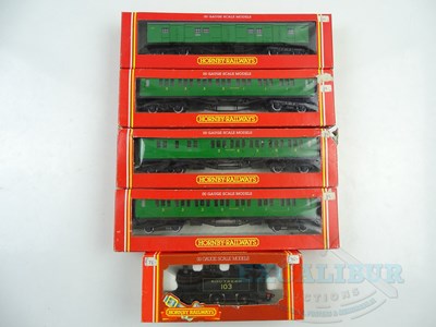 Lot 335 - A group of HORNBY OO gauge rolling stock...