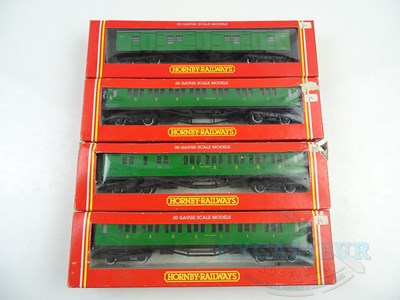 Lot 335 - A group of HORNBY OO gauge rolling stock...