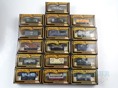 Lot 415 - A mixed group of MAINLINE OO gauge wagons as...