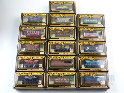 Lot 416 - A mixed group of MAINLINE OO gauge wagons as...