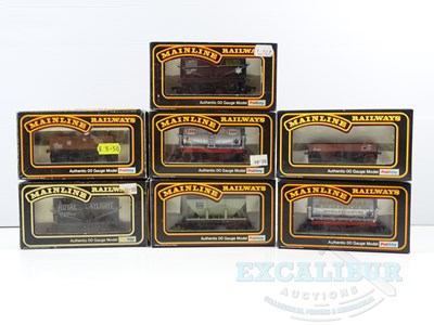 Lot 423 - A group of MAINLINE OO gauge wagons of various...