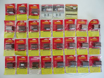 Lot 457 - A group of HORNBY OO gauge accessories, mostly...