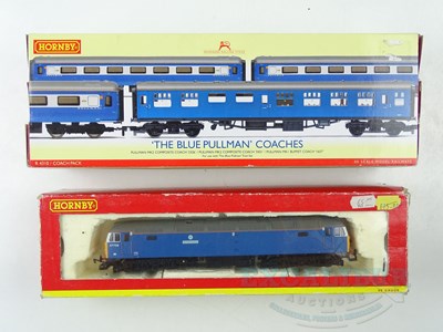 Lot 576 - A group of HORNBY OO gauge rolling stock...