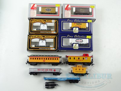 Lot 594 - A group of OO gauge wagons by LIMA and...