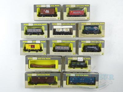 Lot 667 - A group of WRENN OO gauge wagons of various...