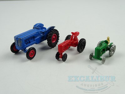 Lot 7 - A group of diecast tractors by ERTL, MATCHBOX...