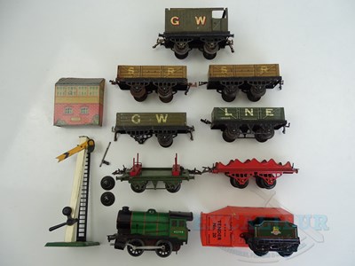 Lot 702 - A group of HORNBY O gauge items comprising...