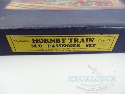 Lot 724 - A pair of HORNBY O gauge clockwork train sets -...