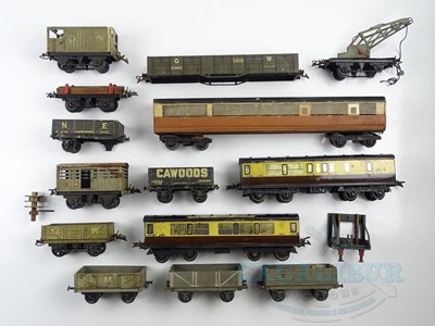 Lot 741 - A group of O gauge wagons and coaches by...