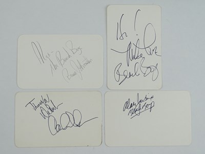 Lot 261 - THE BEACH BOYS: A mixed group of signed cards...