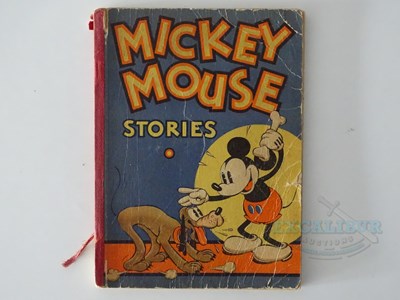 Lot 215 - WALT DISNEY: A selection of Disney related...