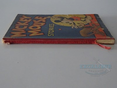 Lot 215 - WALT DISNEY: A selection of Disney related...