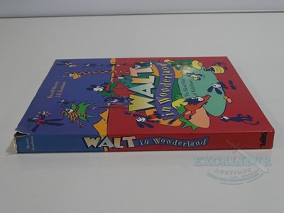 Lot 215 - WALT DISNEY: A selection of Disney related...