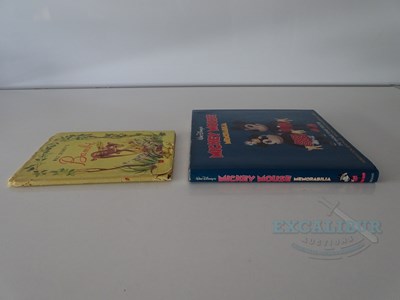 Lot 215 - WALT DISNEY: A selection of Disney related...