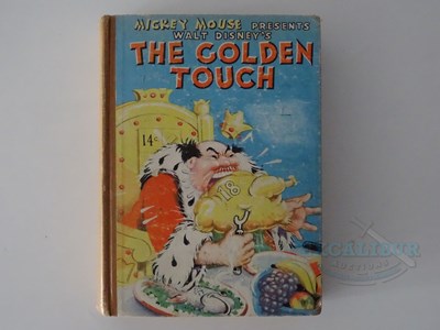 Lot 215 - WALT DISNEY: A selection of Disney related...