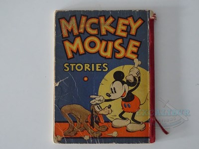 Lot 215 - WALT DISNEY: A selection of Disney related...