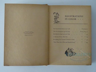 Lot 215 - WALT DISNEY: A selection of Disney related...