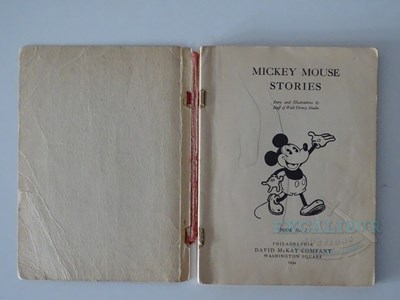 Lot 215 - WALT DISNEY: A selection of Disney related...