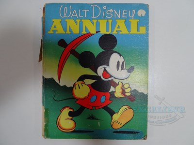 Lot 215 - WALT DISNEY: A selection of Disney related...