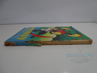 Lot 215 - WALT DISNEY: A selection of Disney related...