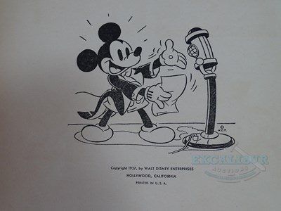 Lot 215 - WALT DISNEY: A selection of Disney related...