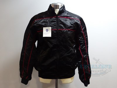 Lot 251 - COBRA (1986) - A black crew jacket with red...